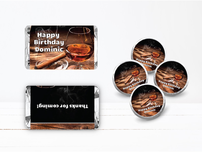 a set of four happy birthday chocolates with a picture of a glass of wine