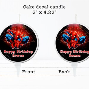 two Spiderman-themed birthday candles, each with a different design and text. The candles are labeled as "Happy Birthday Rowan" and are described as "3" x 4.25" in the top left corner. The candles are shown from both the front and back, allowing for a clear view of their design and size.