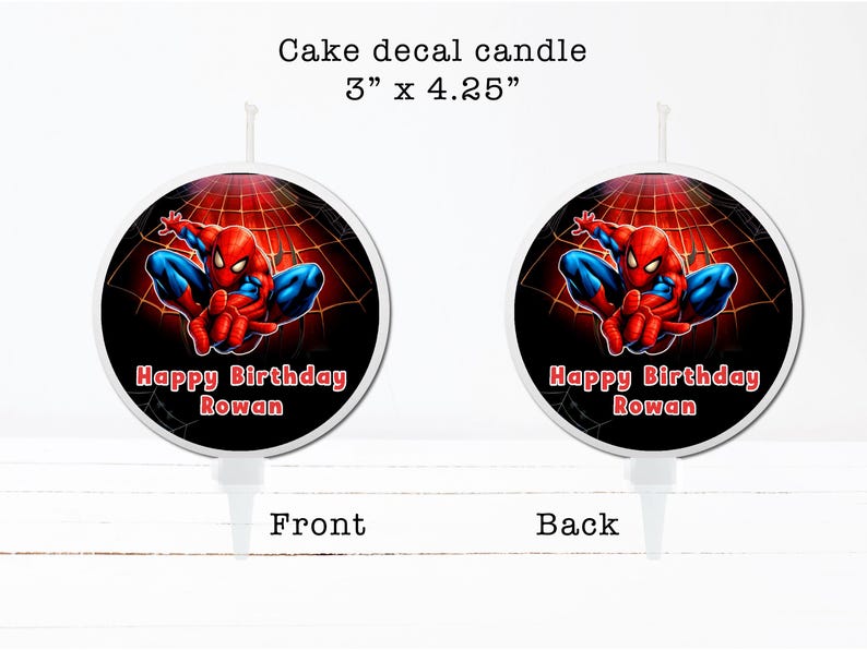 two Spiderman-themed birthday candles, each with a different design and text. The candles are labeled as "Happy Birthday Rowan" and are described as "3" x 4.25" in the top left corner. The candles are shown from both the front and back, allowing for a clear view of their design and size.