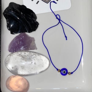 Evil eye string bracelet