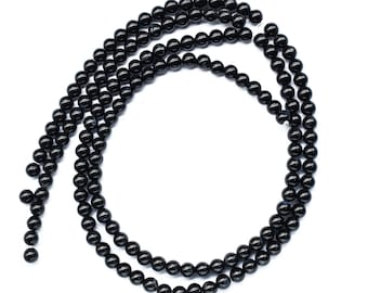 Svart onyx slät ädelstensbriolet, svart onyx ädelsten 6 mm till 7 mm rund form 15 tum pärlsträngar smycken, onyx pärlsträngar smycken