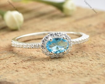 Natural Blue Topaz Sterling Silver Ring, Oval Solitaire with Accent Stones
