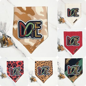 May include: Set of 6 dog bandanas with a camouflage, leopard, red polka dot, black and white paw print, and green camouflage pattern. Each bandana features a colourful "DOPE" patch.
