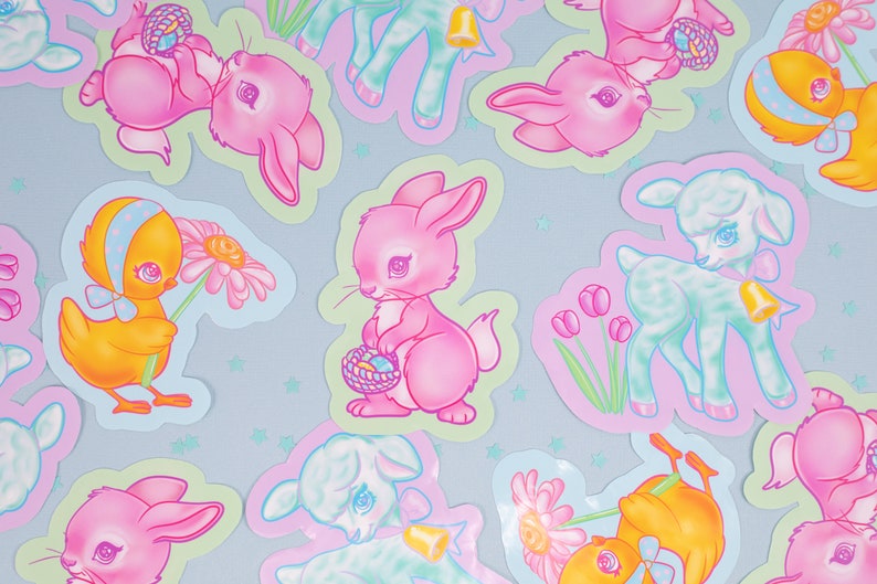 May include: A set of nine pastel-colored Easter stickers featuring a variety of cute animals, including bunnies, chicks, and lambs. The stickers are decorated with flowers, eggs, and other Easter-themed details.