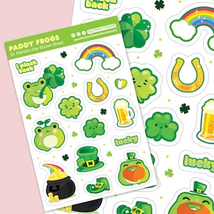 May include: A sticker sheet with a St. Patrick's Day theme featuring green frogs, shamrocks, rainbows, gold coins, a pot of gold, a horseshoe, a beer mug, and a leprechaun hat. The sheet includes the text "Paddy Frogs" and "I pinch back".