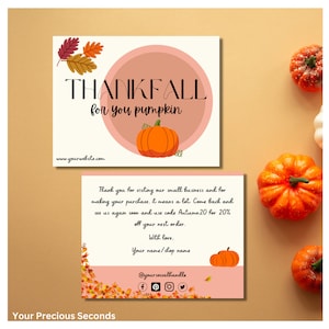 May include: Thank you card with a fall theme. The card has a pink background with a circle in the center. The circle has the text "THANKFALL for you pumpkin" in black. There is a pumpkin in the circle. The card also has the text "www.yourwebsite.com". The bottom of the card has the text "Thank you for visiting our small business and for making your purchase, it means a lot. Come back and see us again soon and use code Autumn20 for 20% off your next order. With love. Your name/shop name @yoursocialhandle".