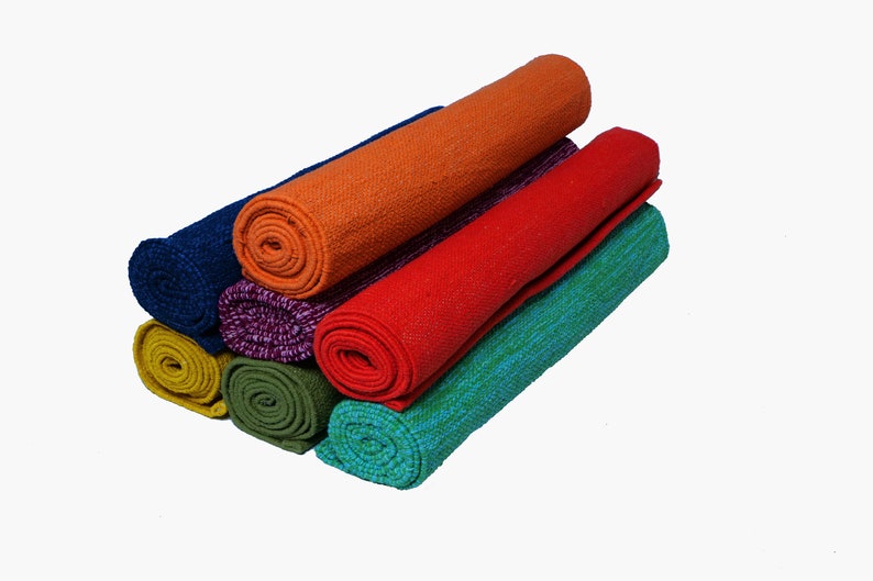 Handloom cotton yoga mat with eco friendly non slip woven texture for daily yoga practice