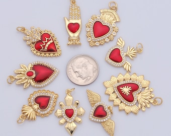 May include: Nine gold-tone charms with red enamel hearts and clear rhinestone accents. The charms feature various designs, including a hand, a crown, wings, and a star.