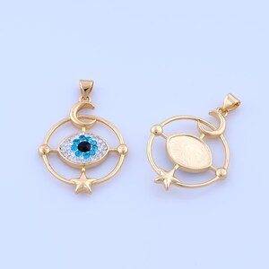 May include: Two gold-colored pendants. One features a blue and white crystal eye design, a crescent moon, and a star. The other pendant has a gold oval shape, a crescent moon, and a star. Both pendants have a circular frame.
