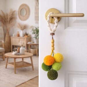 Pom pom door knob hanger. Handmade yarn knob decoration. Unique door knob sign. Pom pom ornament in spring colors. Door sign for kids room.
