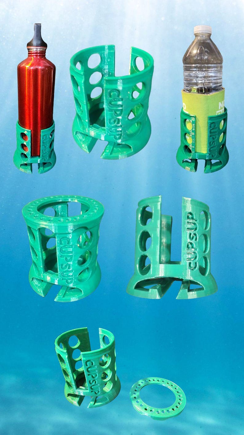 May include: Five green 3D printed plastic bottle and can holders with the word "cupsup" printed on them. The holders are designed to hold a variety of sizes of bottles and cans.