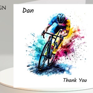 May include: A white greeting card with a watercolor illustration of a cyclist in motion. The cyclist is wearing a blue and yellow uniform and helmet. The card has the text "Design 3", "Dan", and "Thank You".