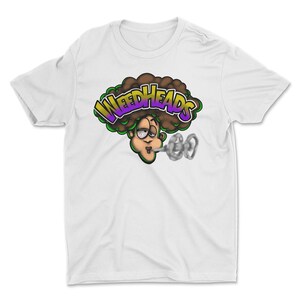 May include: White t-shirt featuring a cartoon illustration of a person exhaling smoke. The person has brown curly hair and bloodshot eyes. The text "WEEDHEADS" is above the person's head in a green, purple, and yellow font.