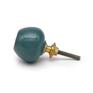 Pair of green ceramic knobs with brass hardware, perfect as drawer knobs or cabinet pulls.