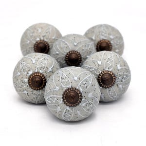 Gray ceramic knobs with hand-painted white mandala floral pattern, bronze back, threaded metal screw, home decor hardware