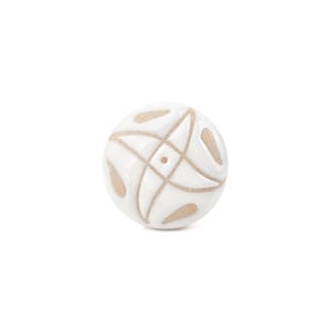 May include: A round white ceramic knob featuring a central dot surrounded by four curved, tan-colored petal-like shapes that extend toward the edges, creating a symmetrical, pinwheel-inspired pattern across the surface of the circular object.