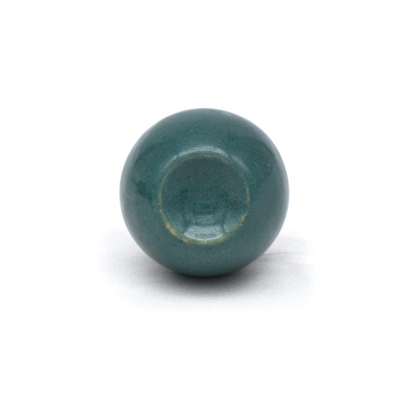 Pair of green ceramic knobs with brass hardware, perfect as drawer knobs or cabinet pulls.