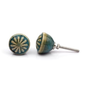 May include: A collection of twelve decorative cabinet knobs in various colours and patterns. Each knob features a round or oval shape with a metal bolt extending from the back. The designs include floral, geometric, and solid textures in shades of green, blue, orange, purple, white, and grey.