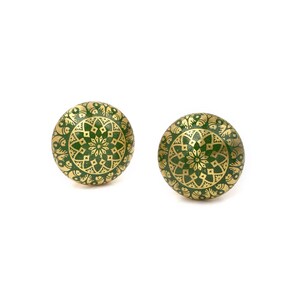 Brass cabinet knobs in vintage style with green and gold etched mandala pattern; decorative drawer pulls for furniture hardware.
