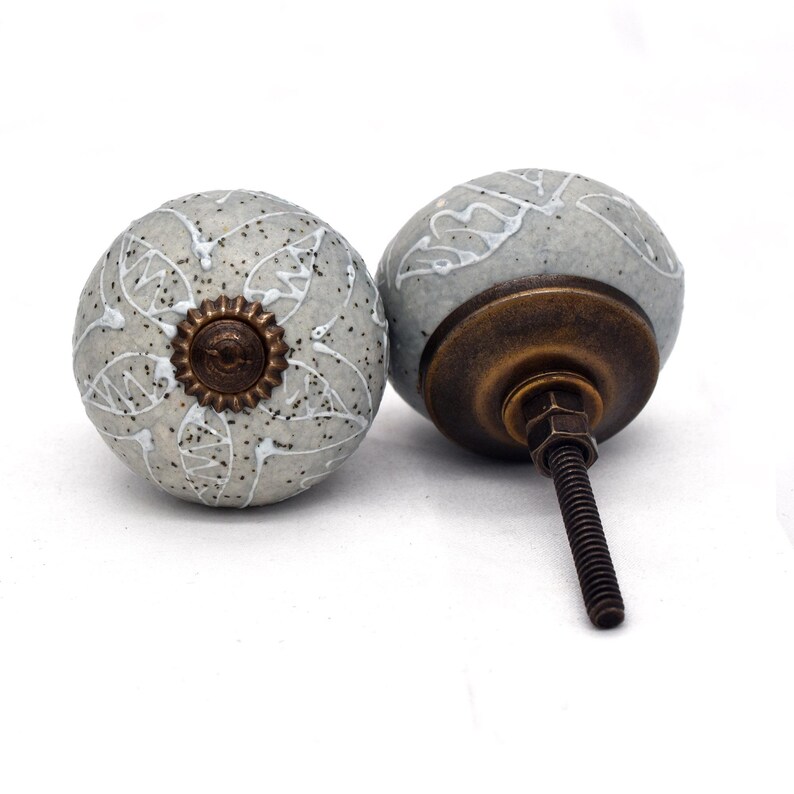 Gray ceramic knobs with hand-painted white mandala floral pattern, bronze back, threaded metal screw, home decor hardware