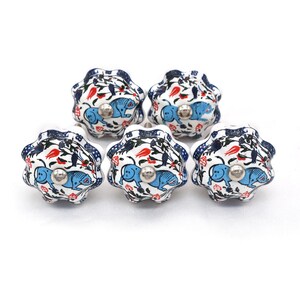 Hand-painted ceramic pumpkin knob in blue, green, and red with floral motif for kitchen cabinet knobs.