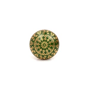 Brass cabinet knobs in vintage style with green and gold etched mandala pattern; decorative drawer pulls for furniture hardware.