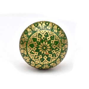 Brass cabinet knobs in vintage style with green and gold etched mandala pattern; decorative drawer pulls for furniture hardware.
