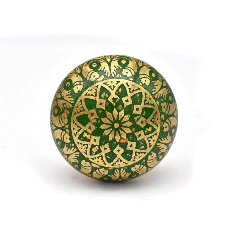Brass cabinet knobs in vintage style with green and gold etched mandala pattern; decorative drawer pulls for furniture hardware.