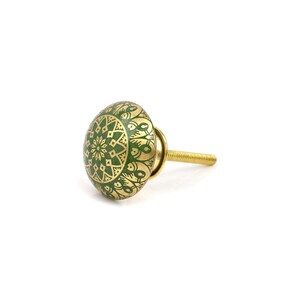 Brass cabinet knobs in vintage style with green and gold etched mandala pattern; decorative drawer pulls for furniture hardware.