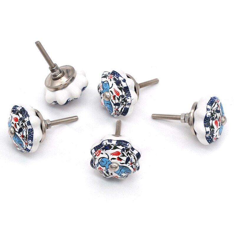 Hand-painted ceramic pumpkin knob in blue, green, and red with floral motif for kitchen cabinet knobs.