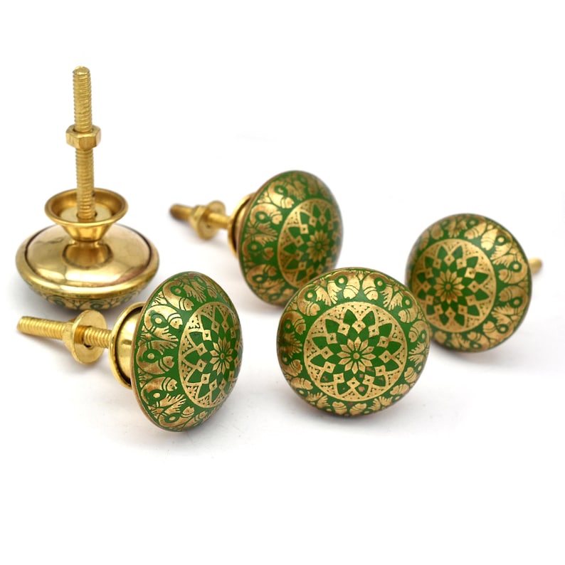 Brass cabinet knobs in vintage style with green and gold etched mandala pattern; decorative drawer pulls for furniture hardware.