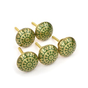 Brass cabinet knobs in vintage style with green and gold etched mandala pattern; decorative drawer pulls for furniture hardware.