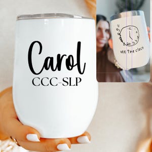 May include: White insulated wine tumbler with the name "Carol" and "CCC-SLP" in black script. A second tumbler shows a hand-drawn clock with the words "off the clock".