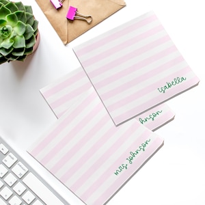 personalized post it note. Pink and white stripe with name in green.