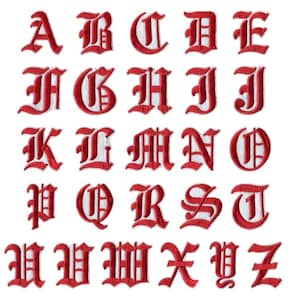 May include: A full alphabet of embroidered letters in a traditional gothic style. Each letter is red with a white interior and a detailed, textured finish. The letters are arranged in rows and columns against a plain white backdrop.