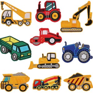 May include: A selection of embroidered patches depicting construction vehicles. The patches include a yellow crane truck, a red tractor, a yellow excavator, a green dump truck, a red steamroller, a blue tractor, a yellow bulldozer, a yellow dump truck, and a red cement mixer.