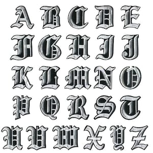 May include: A collection of embroidered iron-on letters in a gothic style. Each letter has a black outline and a lighter grey fill, giving a 3D appearance. The letters are presented against a white backdrop.