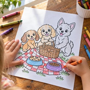 May include: A coloring page featuring three cartoon puppies on a red and white checkered picnic blanket. The scene includes a brown picnic basket, a blue bowl filled with bone-shaped treats, and a purple bowl containing small round food pieces.
