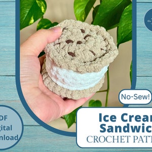 May include: A crocheted ice cream sandwich with chocolate chip cookies and vanilla ice cream. The pattern is a digital download and is no-sew. The text "No-Sew! Ice Cream Sandwich CROCHET PATTERN" is on the image.