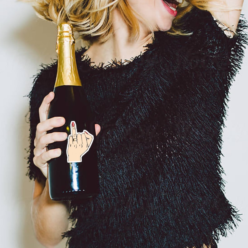 Ring finger sticker on Champagne Bottle