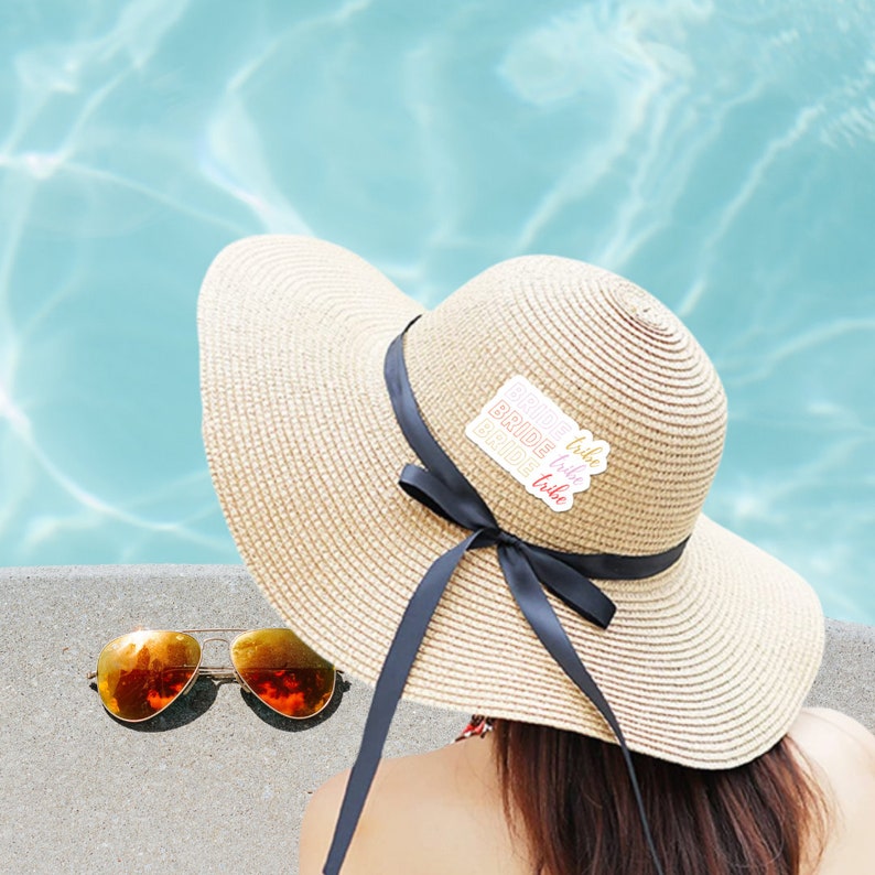 Bride Tribe sticker on Womans Hat in pool