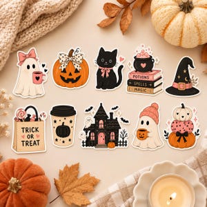 May include: A collection of ten Halloween-themed stickers featuring a ghost with a pink bow, a jack-o'-lantern, a black cat, a stack of books labeled Potions Spells Magic, a witch hat, a trick or treat bag, a coffee cup, a haunted house, a ghost in a beanie, and pumpkins.