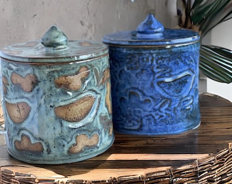 Handmade Ceramic Lidded Jar with flowers and birds imprinting pattern.