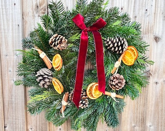 DIY Christmas Wreath Kit: Fresh Foliage, Pine Cones, and Moss.
