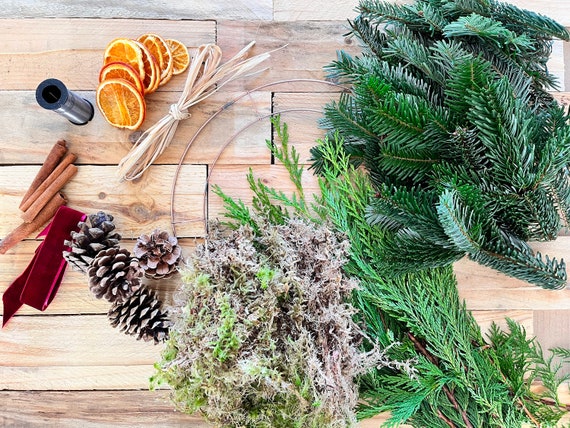 DIY Christmas Wreath Kit: Fresh Foliage, Pine Cones, and Moss.