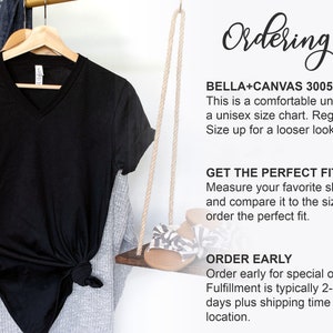 May include: A black v-neck t-shirt on a hanger with ordering tips for Bella+Canvas 3005 unisex shirts. The text says, "Bella+Canvas 3005 is unisex. This is a comfortable unisex shirt with a unisex size chart. Regular retail fit. Size up for a looser look. Get the perfect fit. Measure your favorite shirt at home and compare it to the size chart to order the perfect fit. Order early. Order early for special occasions. Fulfillment is typically 2-7 business days plus shipping time to your location."