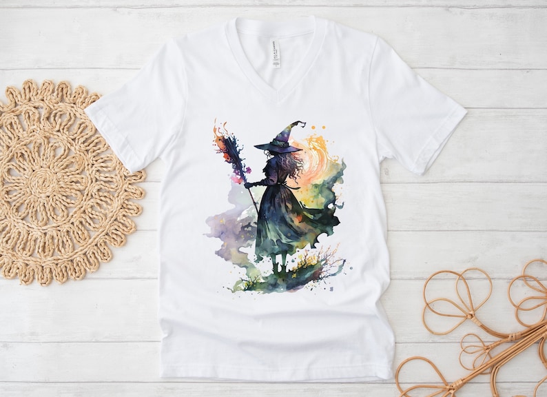 This beautiful Watercolor Witch T Shirt is great for Halloween, fall, autumn or anytime you are feeling magical! The design features an artistic watercolor witch in pretty colors. Purchase for yourself or as a gift for your favorite magical someone.
