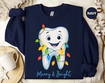 Sudadera navideña de dentista: diente envuelto en luces navideñas