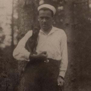Sailor and chihuahua, 1920s, RPPC, Vintage photo