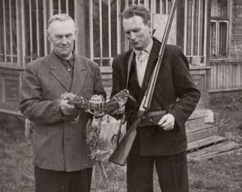Men after bird hunt, Vintage photo